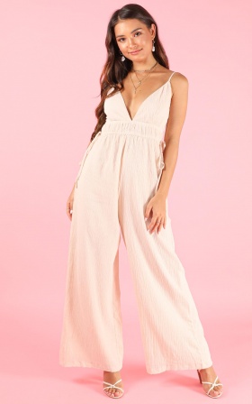 cream jump suits